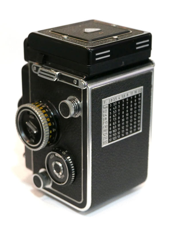 Rollei 3.5 F révisé + bouchon avant + parasoleil...