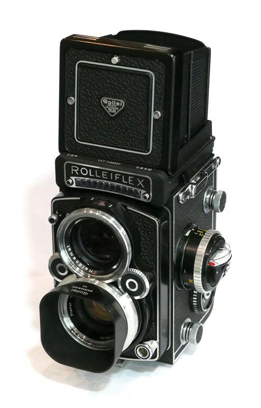 Rollei 2.8 F Planar avec cellule, étui cuir, parasoleil, bouchon