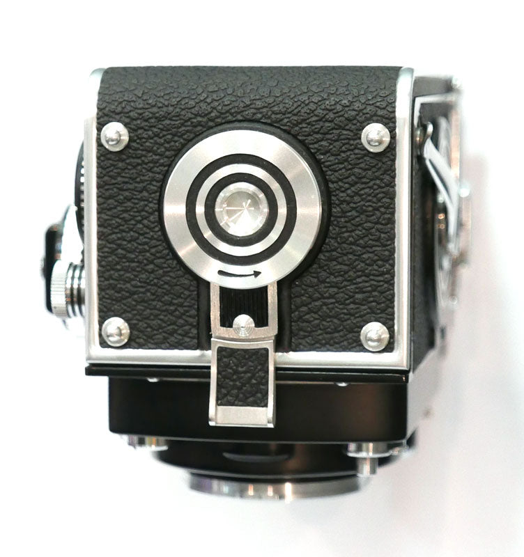 Rollei 2.8 F Planar avec cellule, étui cuir, parasoleil, bouchon